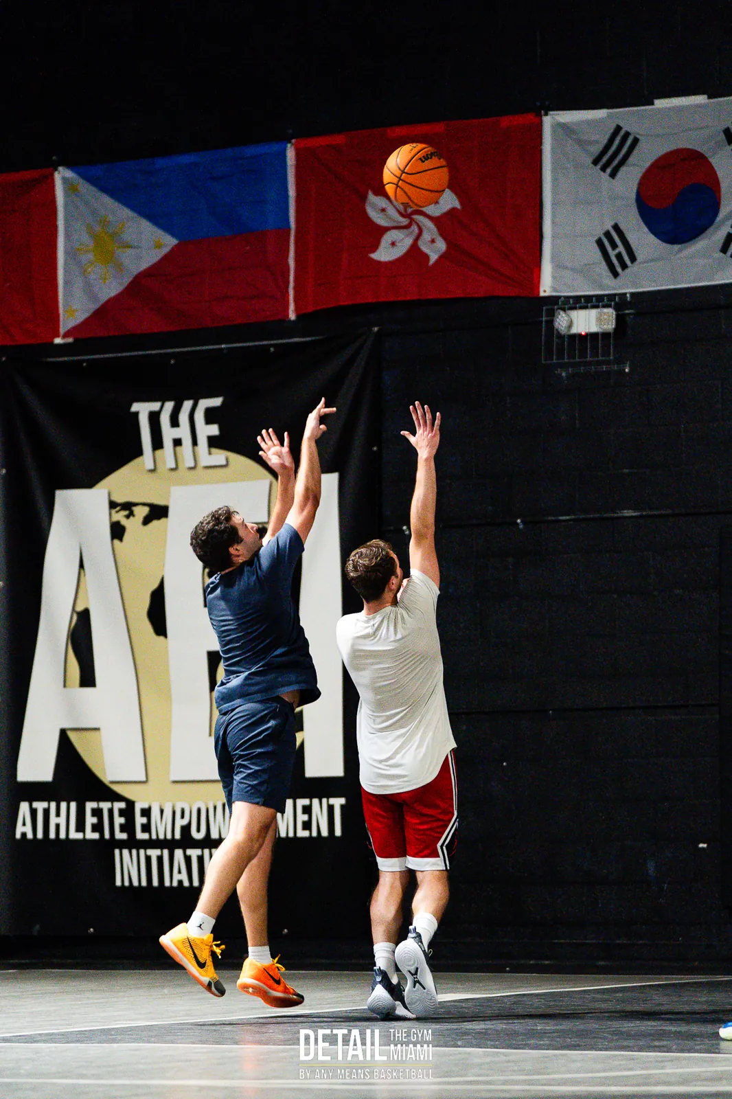 Player rising for a jump shot over a defender at DETAIL Miami
