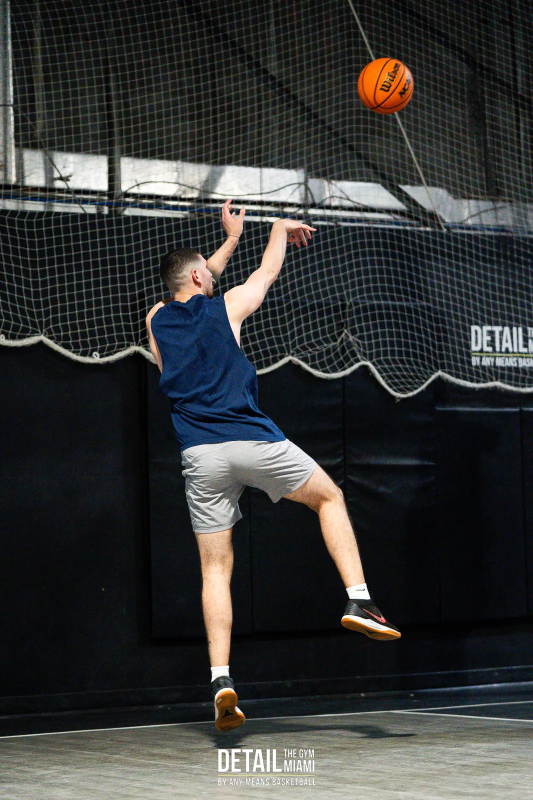 Shooting into the netted training bay at DETAIL Miami